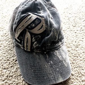 Remington adjustable hat camo in color.